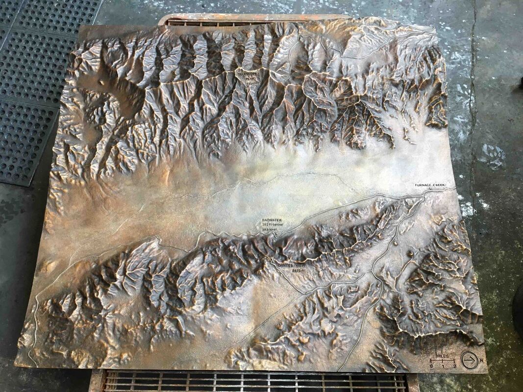 Close-up of Badwater Basin bronze relief map